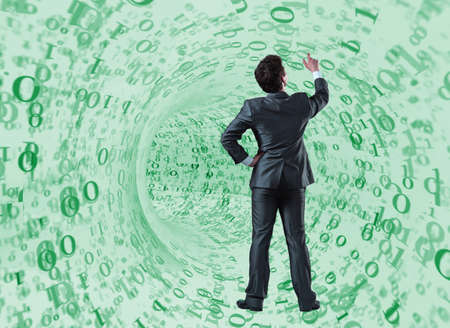 Businessman against the funnel made of binary numbersの写真素材