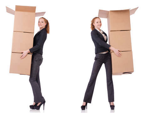 Businesswoman with boxes isolated on whiteの写真素材