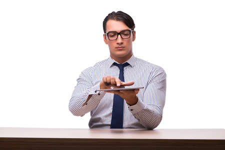 Businessman using his tablet computer isolated on whiteの写真素材