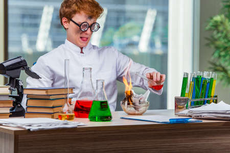 Young crazy chemist working in the lab