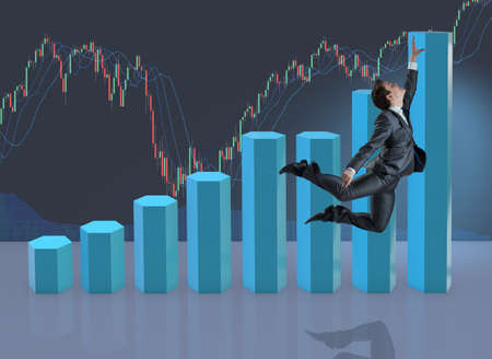 Businessman jumping in business conceptの写真素材