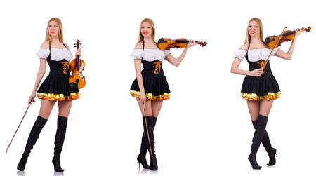 Bavarian girl playing the violin isolated on whiteの写真素材