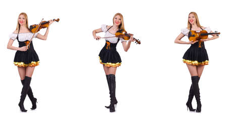 Bavarian girl playing the violin isolated on whiteの写真素材