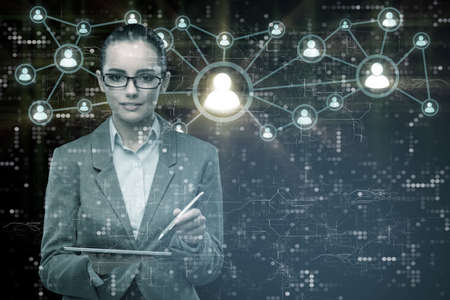 Woman with tablet in social networks conceptの写真素材