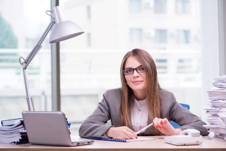 Businesswoman working in the officeの写真素材