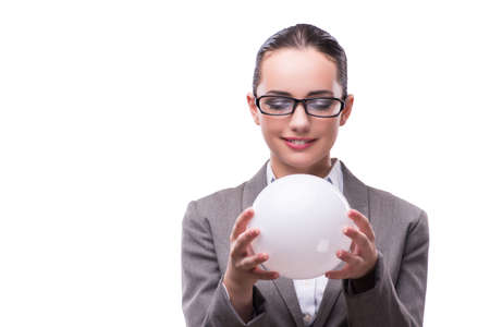 Woman holding crystall ball isolated on whiteの写真素材