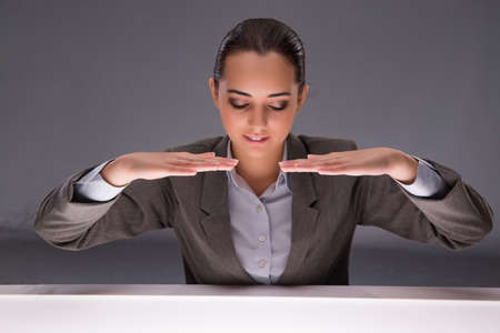 Businesswoman holding hands in business conceptの写真素材