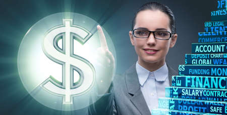 Businesswoman with dollars in business conceptの写真素材