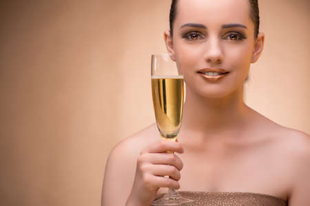 Young woman with champagne glassの写真素材
