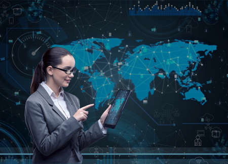 Woman with tablet computer in business conceptの写真素材