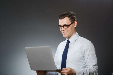 Man with laptop in business concept