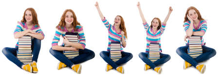 Young student with books isolated on whiteの写真素材