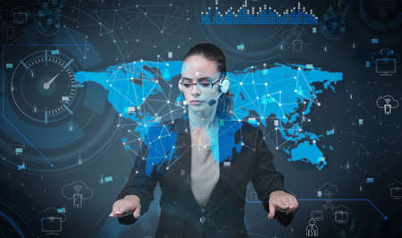 Woman pressing virtual buttons in futuristic conceptの写真素材