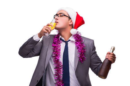 Young businessman celebrating christmas in officeの写真素材