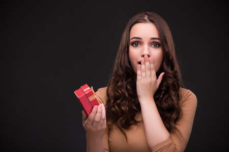 Young woman with giftbox and marriage proposalの写真素材