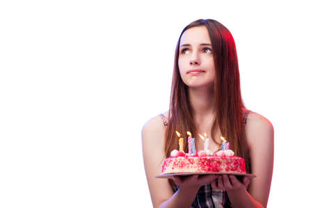 Young woman girl with cake isolated on whiteの写真素材