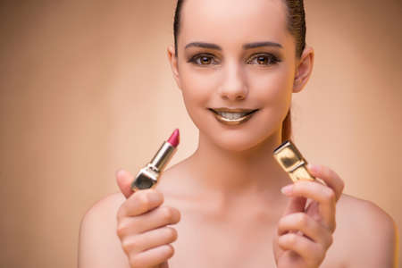Woman with lipstick in beauty conceptの写真素材