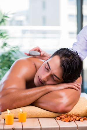 Handsome man during spa sessionの写真素材