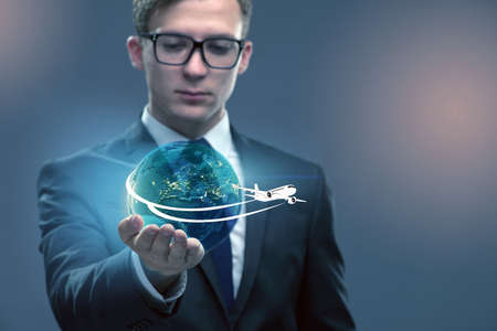 Businessman in air travel conceptの写真素材
