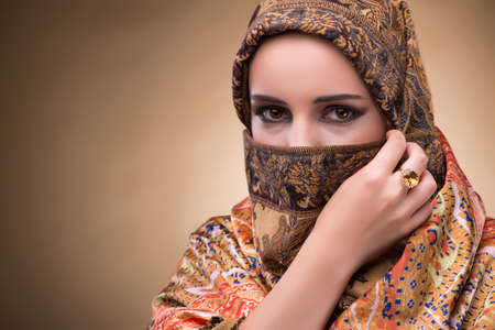 Young woman in traditional muslim clothingの写真素材