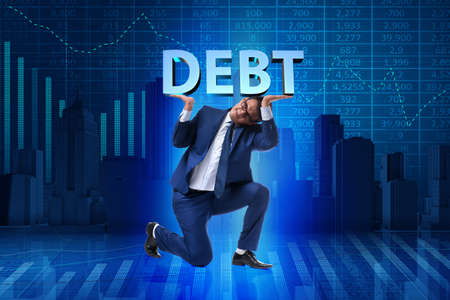 Businessman in debt business conceptの写真素材