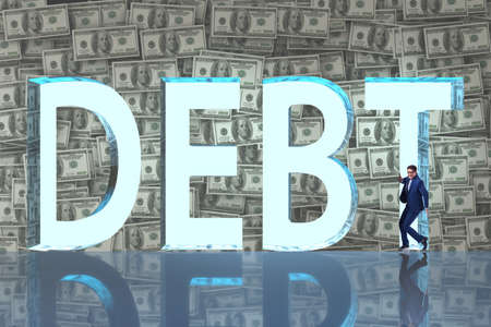 Businessman in debt business conceptの写真素材