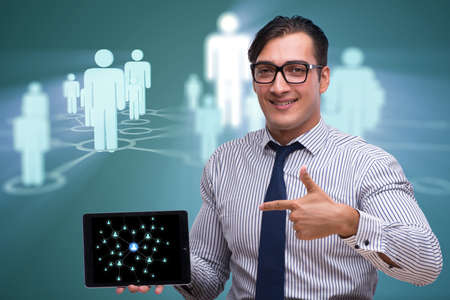 Man with tablet in social networks concept