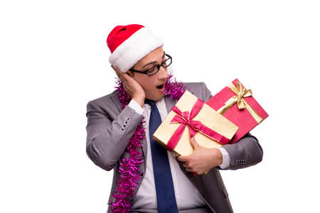 Young businessman celebrating christmas in officeの写真素材