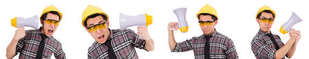 Young construction worker with loudspeaker isolated on whiteの写真素材