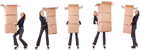 Businesswoman with boxes isolated on whiteの写真素材
