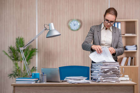 Businesswoman working in the officeの写真素材