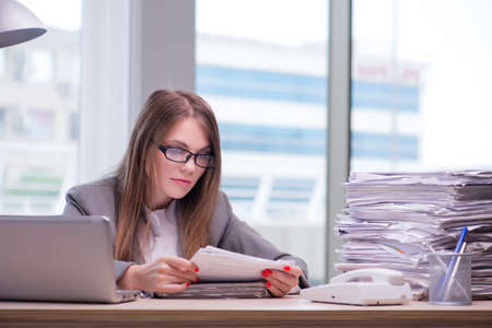 Businesswoman working in the officeの写真素材