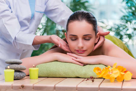 Young woman during massage sessionの写真素材