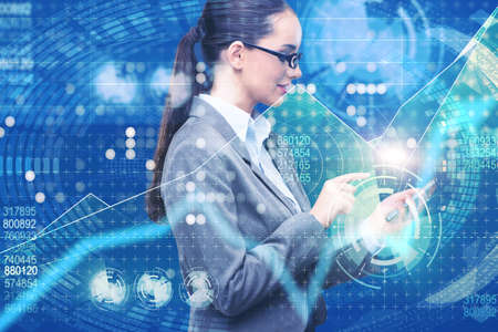 Businesswoman in online stock trading business conceptの写真素材
