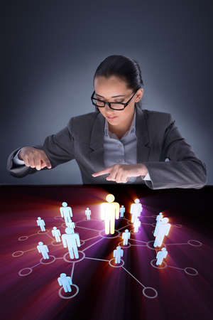 Woman in social networks conceptの写真素材