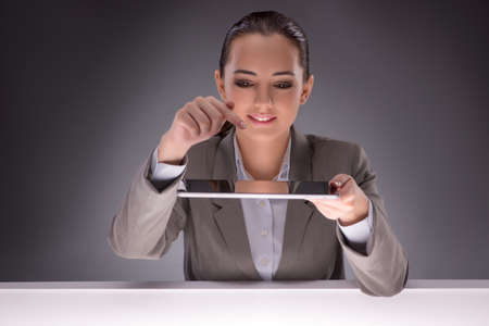 Young businesswoman working with tablet computerの写真素材