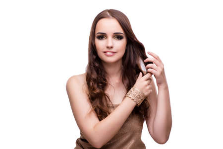 Beautiful woman showing off her jewellery in fashion concept isolated on white