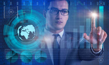 Businessman pressing virtual buttons in futuristic concept