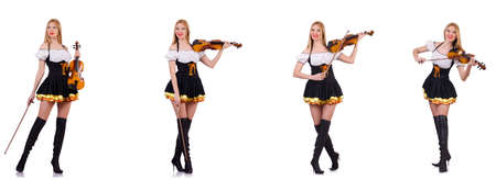 Bavarian girl playing the violin isolated on whiteの写真素材