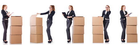 Businesswoman with boxes isolated on whiteの写真素材