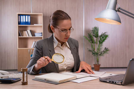 Businesswoman working in the officeの写真素材