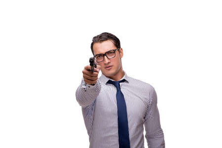 Young businessman with gun isolated on whiteの写真素材