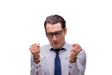 Businessman handcuffed isolated on white