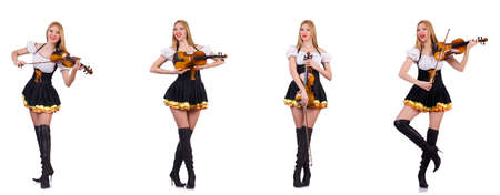 Bavarian girl playing the violin isolated on whiteの写真素材