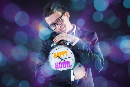 Businessman in happy hour concept