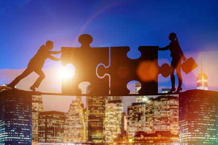 Business concept of teamwork with jigsaw puzzle
