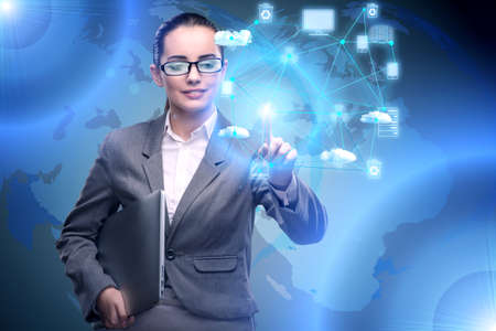 Woman in computing concept pressing buttonsの写真素材