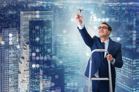 Businessman with star award in business conceptの写真素材