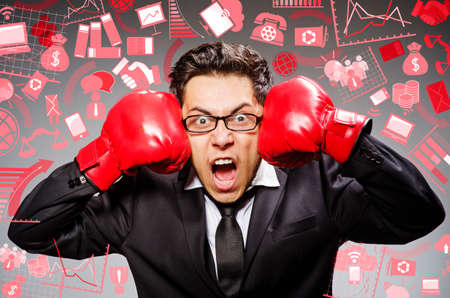 Funny boxer businessman in sport conceptの写真素材