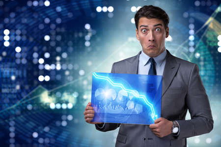 Funny businessman surprised at market quotesの写真素材